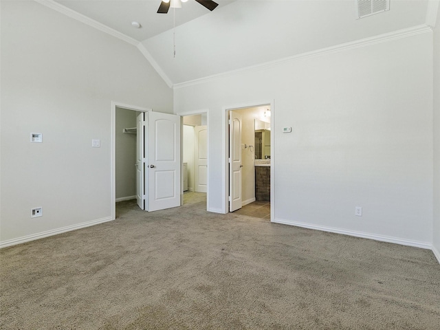 unfurnished bedroom featuring visible vents, crown molding, and carpet flooring