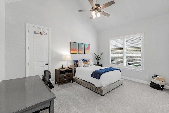 bedroom with baseboards, high vaulted ceiling, ceiling fan, and carpet floors