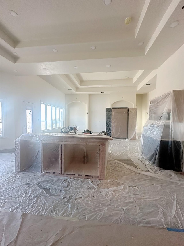 interior space with a tray ceiling