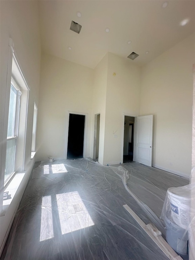 empty room featuring a high ceiling
