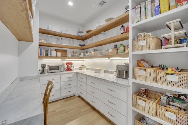 pantry featuring a toaster and visible vents