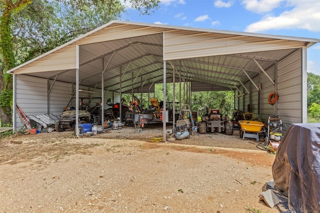 view of vehicle parking featuring a carport