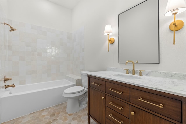 bathroom with toilet, vanity, and shower / bathing tub combination