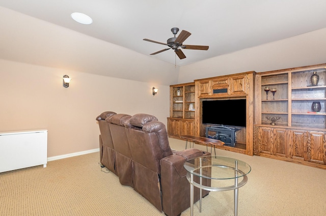 905 Maybach Ct, Mckinney, TX 75071 - living room featuring ceiling fan, light colored carpet, radiator, baseboards, and lofted ceiling