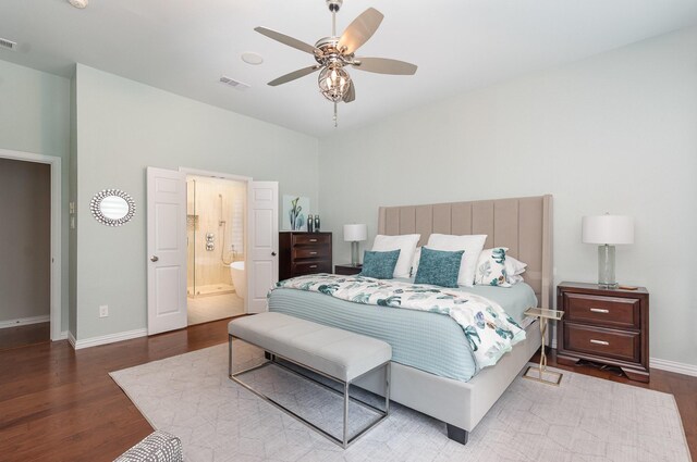 905 Maybach Ct, Mckinney, TX 75071 - bedroom with a ceiling fan, visible vents, wood finished floors, baseboards, and connected bathroom