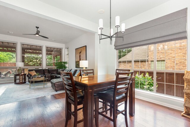 905 Maybach Ct, Mckinney, TX 75071 - dining area with ceiling fan with notable chandelier and wood finished floors