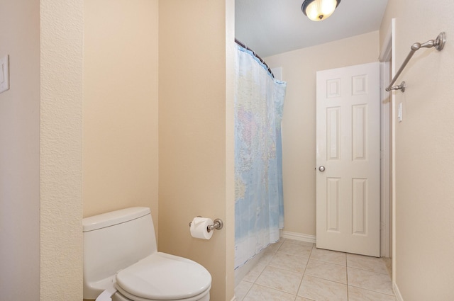 905 Maybach Ct, Mckinney, TX 75071 - bathroom featuring tile patterned flooring, baseboards, toilet, and a shower with curtain