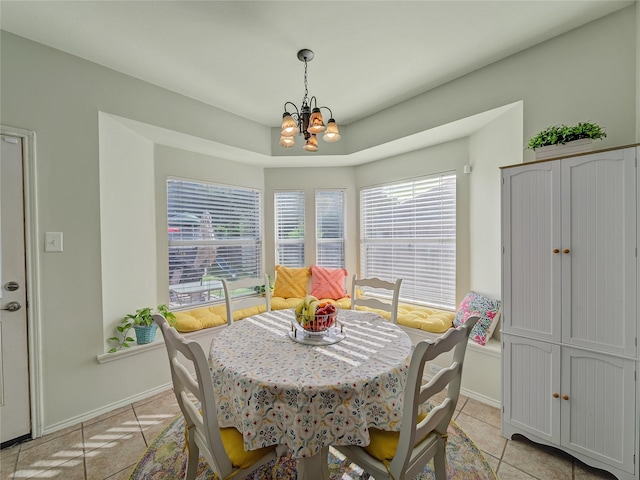 3115 Reagenea Dr, Wylie, TX 75098 - dining room featuring light tile patterned floors, baseboards, and a notable chandelier