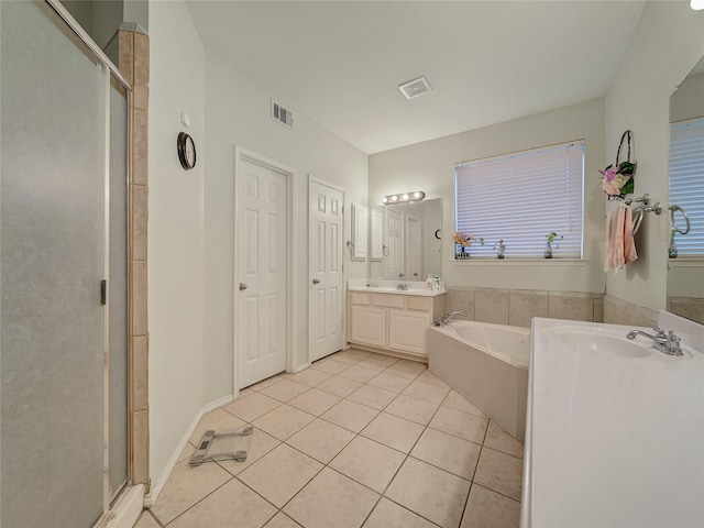 3115 Reagenea Dr, Wylie, TX 75098 - bathroom featuring tile patterned flooring, a garden tub, a stall shower, and visible vents