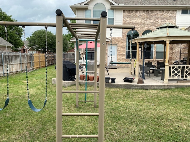 3115 Reagenea Dr, Wylie, TX 75098 - view of play area featuring outdoor lounge area, fence, a patio, a gazebo, and a yard