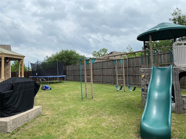 3115 Reagenea Dr, Wylie, TX 75098 - view of playground with a lawn, a fenced backyard, and a trampoline