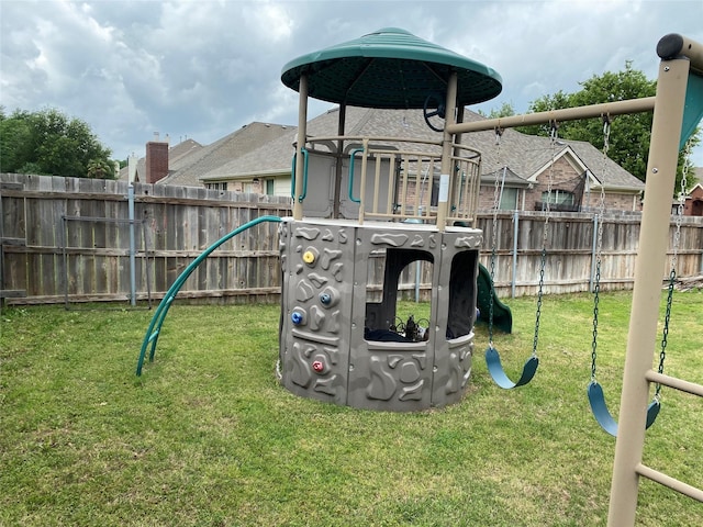 3115 Reagenea Dr, Wylie, TX 75098 - view of play area with a lawn and fence