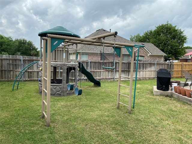 3115 Reagenea Dr, Wylie, TX 75098 - view of jungle gym with a lawn and a fenced backyard