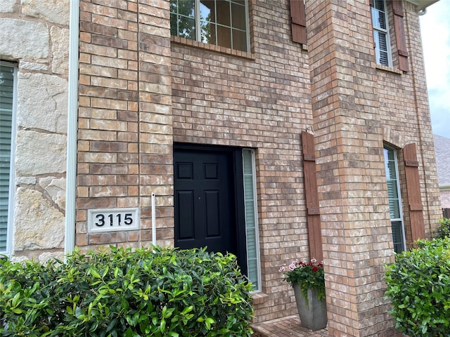 3115 Reagenea Dr, Wylie, TX 75098 - property entrance featuring brick siding