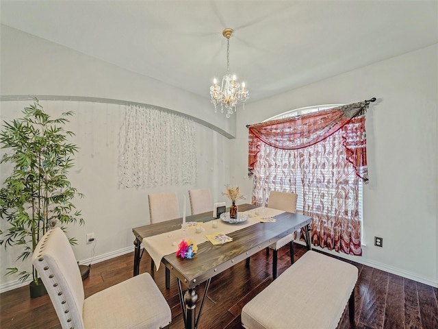 3115 Reagenea Dr, Wylie, TX 75098 - dining room featuring baseboards, wood finished floors, and a notable chandelier