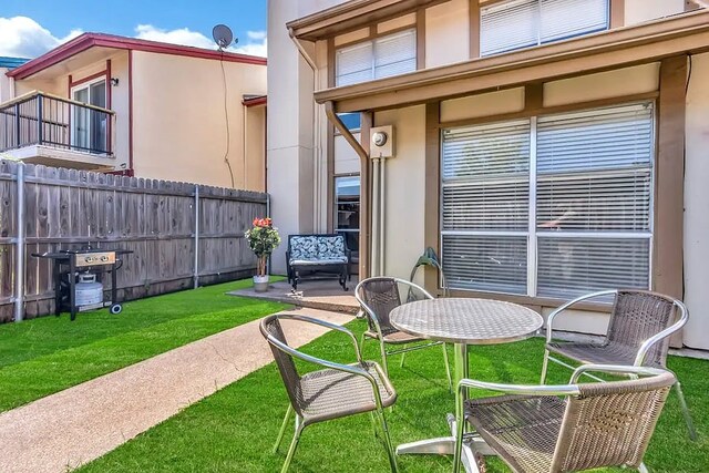 view of patio / terrace featuring fence and area for grilling