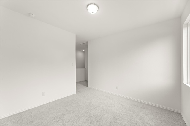 921 Janwood, Plano, TX 75075 - carpeted spare room featuring a smoke detector and baseboards