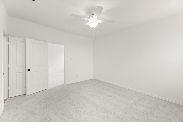 921 Janwood, Plano, TX 75075 - unfurnished bedroom with carpet flooring, baseboards, and ceiling fan