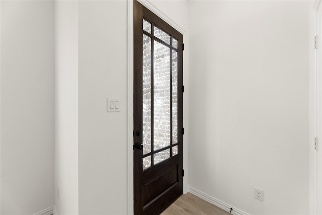 921 Janwood, Plano, TX 75075 - foyer entrance featuring baseboards and light wood-style flooring