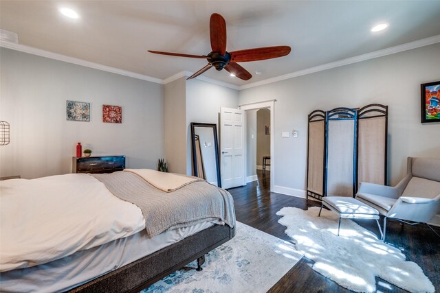 bedroom featuring crown molding, recessed lighting, and dark wood finished floors
