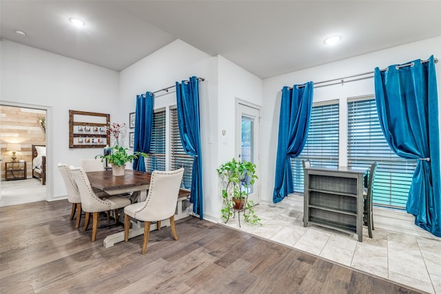 dining area with wood finished floors