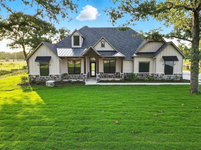 165 Rio Rancho Dr, Decatur, TX 76234 - modern farmhouse style home with board and batten siding, a standing seam roof, a shingled roof, and a front yard