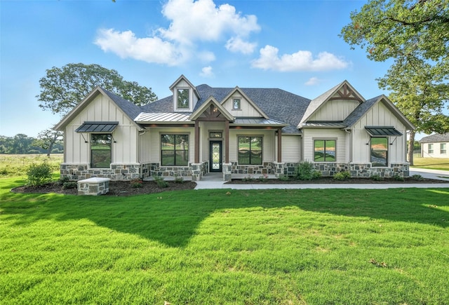 165 Rio Rancho Dr, Decatur, TX 76234 - view of front of house featuring board and batten siding, a standing seam roof, a porch, and a front lawn