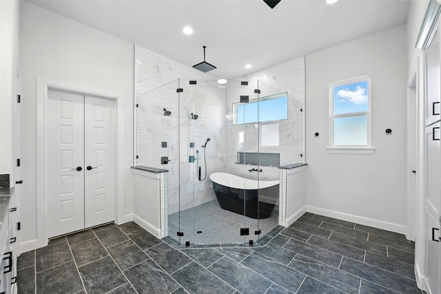 165 Rio Rancho Dr, Decatur, TX 76234 - full bath with a freestanding bath, a stall shower, and recessed lighting