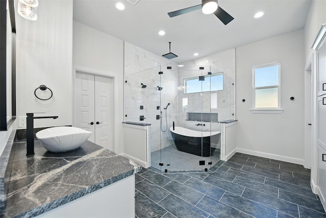 165 Rio Rancho Dr, Decatur, TX 76234 - bathroom featuring vanity, a shower stall, a ceiling fan, and recessed lighting