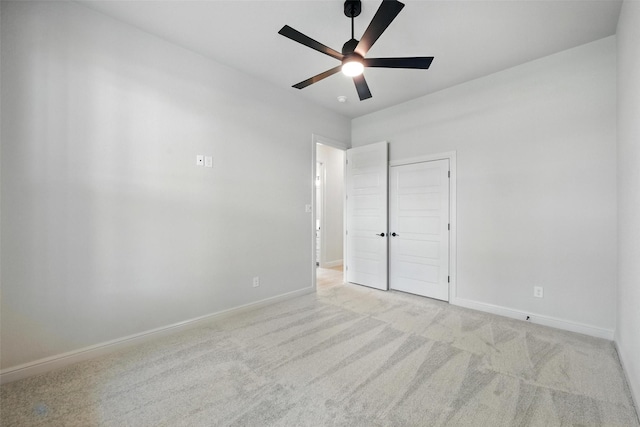 165 Rio Rancho Dr, Decatur, TX 76234 - unfurnished bedroom with light carpet and a ceiling fan