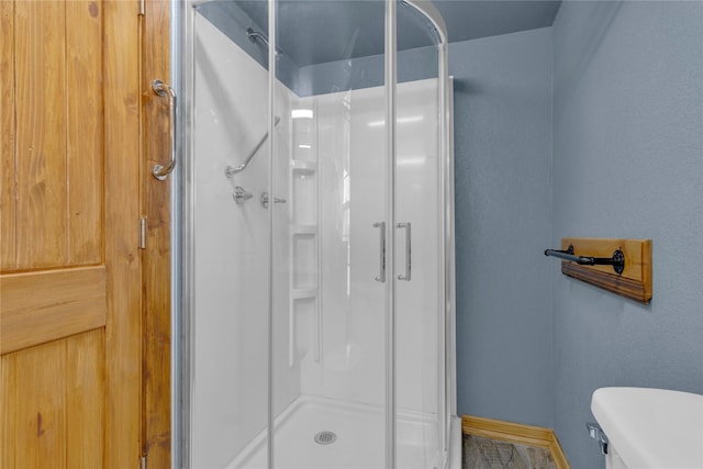 4403 Fm-205, Glen Rose, TX 76043 - full bathroom with toilet, a stall shower, and baseboards