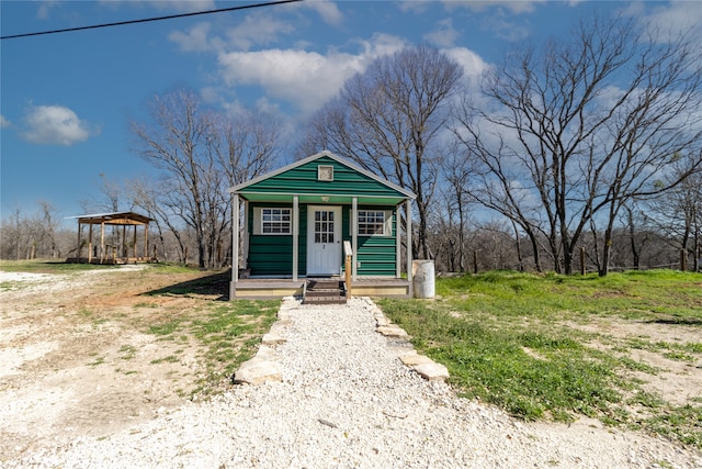 4403 Fm-205, Glen Rose, TX 76043 - shotgun-style home with an outbuilding and a detached carport