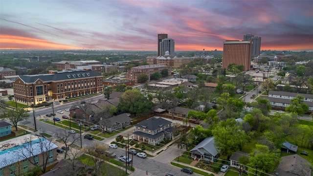 521 Texas St, Denton, TX 76209 - aerial view at dusk featuring a city view