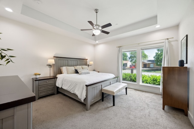 4435 Cicero St, Dallas, TX 75216 - bedroom featuring a raised ceiling, recessed lighting, carpet flooring, and a ceiling fan