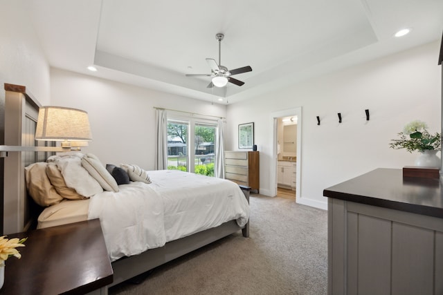 4435 Cicero St, Dallas, TX 75216 - bedroom featuring light colored carpet, recessed lighting, and a tray ceiling