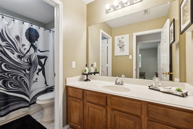 bathroom with visible vents, tile patterned flooring, toilet, and vanity
