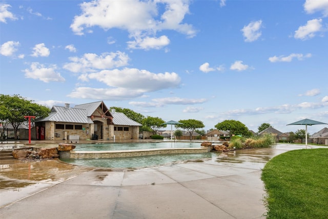 outdoor pool featuring a patio area