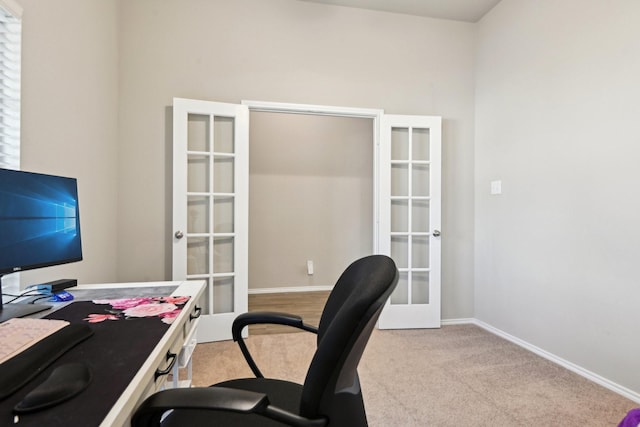office space featuring french doors, baseboards, and carpet floors