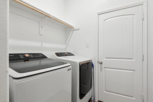 laundry area with laundry area and washing machine and dryer