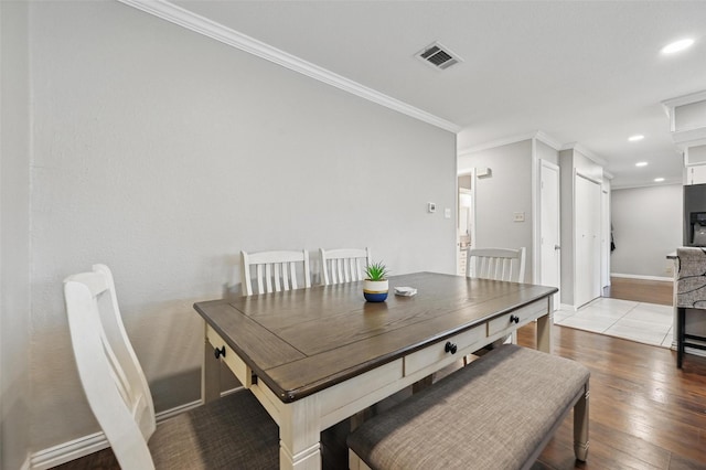 1501 SE 4th St, Grand Prairie, TX 75051 - dining room featuring ornamental molding, hardwood / wood-style flooring, and recessed lighting