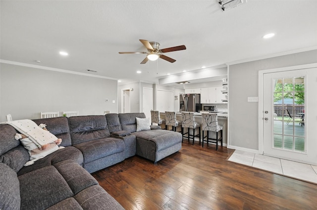 1501 SE 4th St, Grand Prairie, TX 75051 - living room featuring ceiling fan, hardwood / wood-style floors, recessed lighting, and ornamental molding