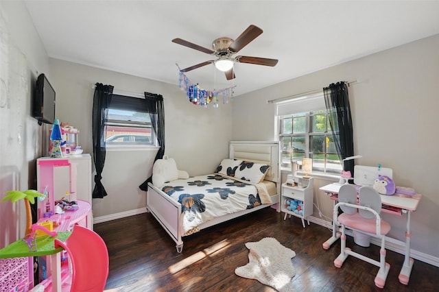 1501 SE 4th St, Grand Prairie, TX 75051 - bedroom with multiple windows, wood finished floors, and ceiling fan