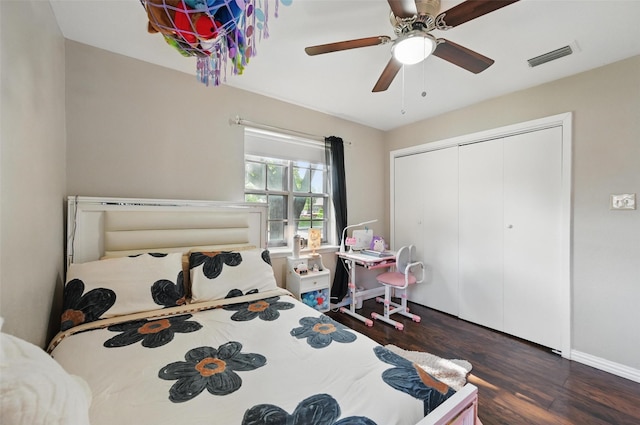 1501 SE 4th St, Grand Prairie, TX 75051 - bedroom featuring wood finished floors, a closet, and a ceiling fan