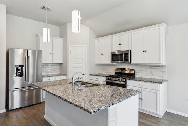 kitchen featuring dark wood-style floors, visible vents, appliances with stainless steel finishes, and a sink