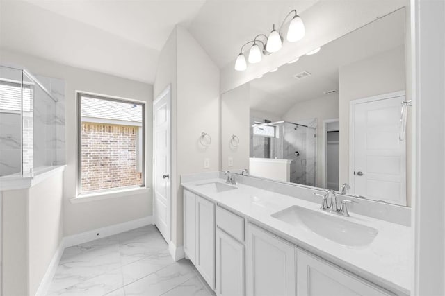 214 Fairmont, Princeton, TX 75407 - full bathroom with a marble finish shower, marble finish floor, a sink, and vaulted ceiling