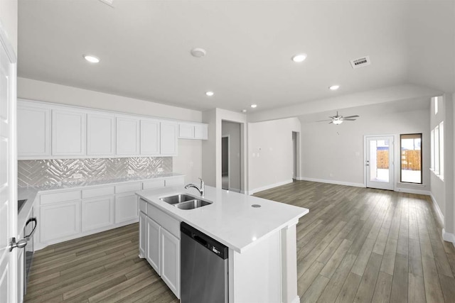214 Fairmont, Princeton, TX 75407 - kitchen featuring a sink, light wood-type flooring, tasteful backsplash, visible vents, and stainless steel dishwasher