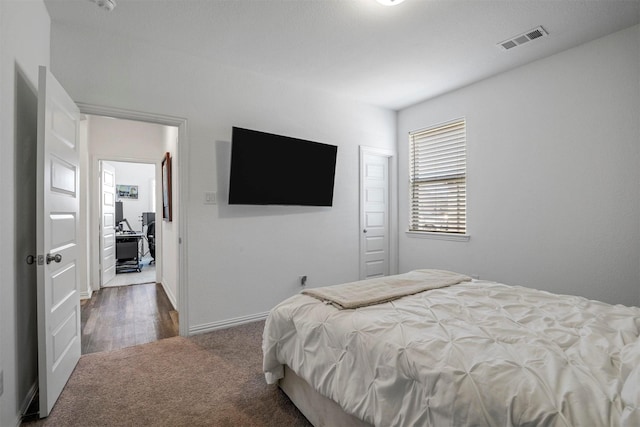 7005 Lowbranch Trl, Little Elm, TX 76227 - bedroom featuring visible vents, baseboards, and carpet floors