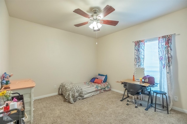 bedroom featuring baseboards, carpet flooring, and ceiling fan