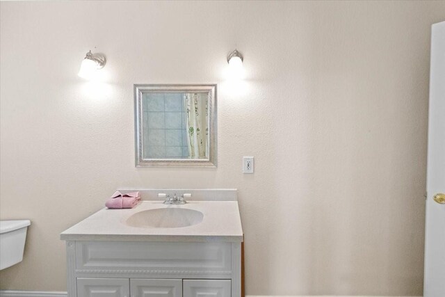 5841 Tracyne Dr, Westworth Village, TX 76114 - bathroom with toilet and vanity