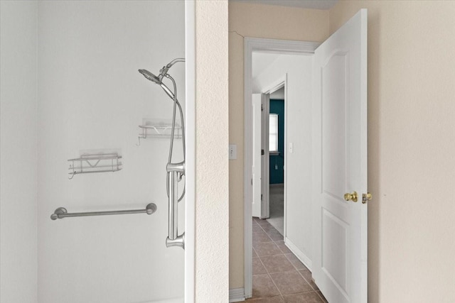 5841 Tracyne Dr, Westworth Village, TX 76114 - hall with dark tile patterned floors